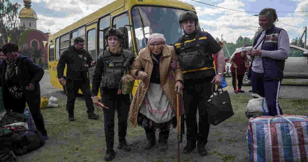 Russia presses renewed border assault in northeast Ukraine as thousands flee 