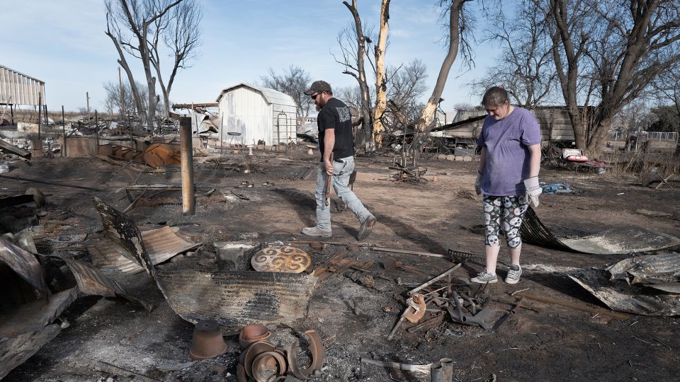 Crews battling massive Texas wildfires get a crucial opportunity to contain flames in calmer weather Monday 