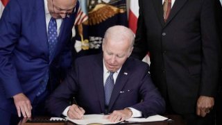 US President Biden signs law to reduce inflation