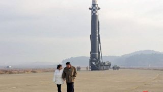 Kim Jong's first image with his daughter was with a ballistic missile!
