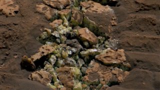 Accidentally exposed yellowish-green crystals reveal ‘mind-blowing’ finding on Mars, scientists say 