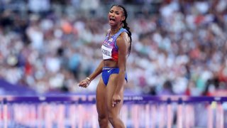 American Masai Russell wins Olympic women's 100m hurdles gold