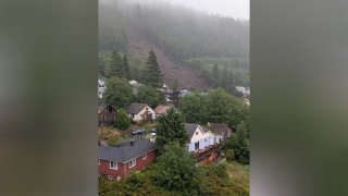 Alaska city issues evacuation orders after landslide leaves 1 dead and 3 injured. Officials worry another slide could strike