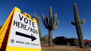 Arizona judge sets 2026 trial date for Trump allies accused of trying to subvert the 2020 election