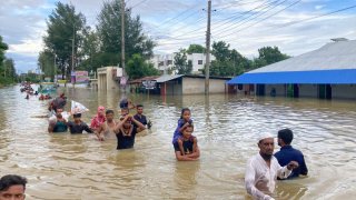 Millions in this country are stranded by flooding. Many blame their neighbor