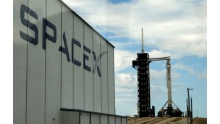 FAA grounds SpaceX after one of its rockets falls over in flames during landing